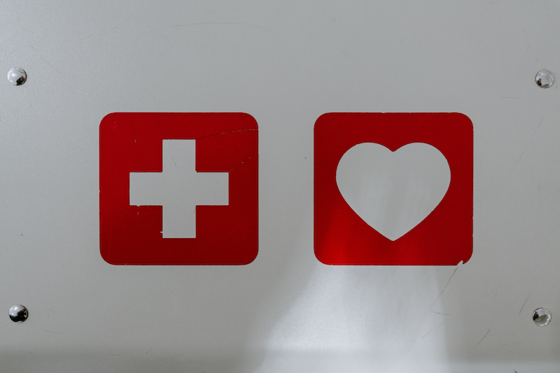 A picture of red cross and heart