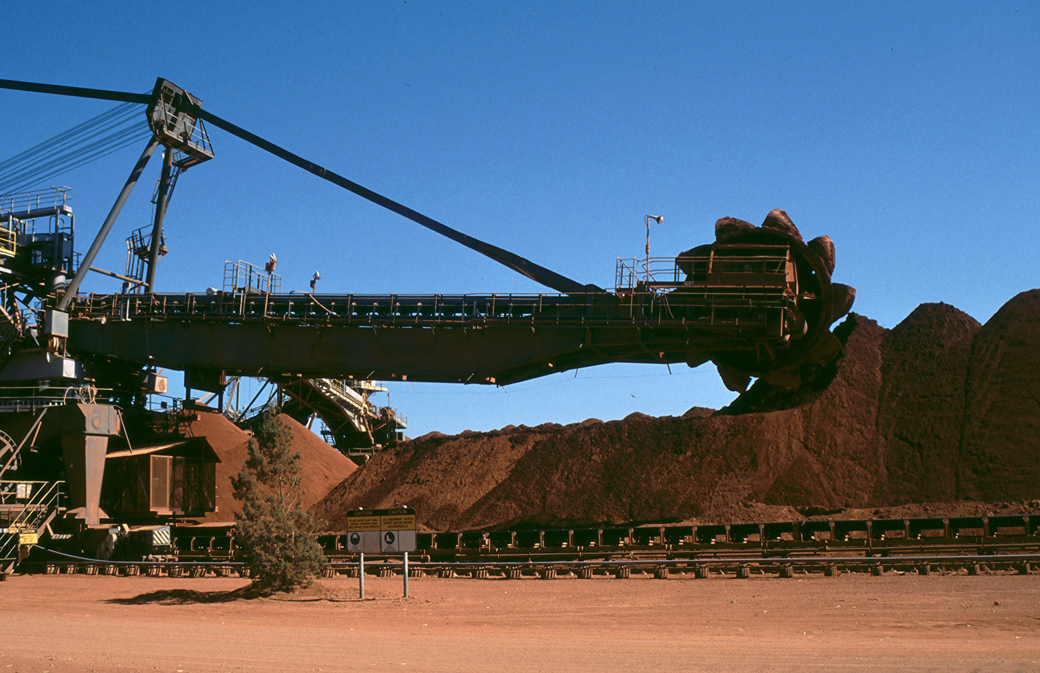 Huge mining equipment in action at the Comalco bauxite mine; Weipa, Cape York Peninsula, Queensland, Australia