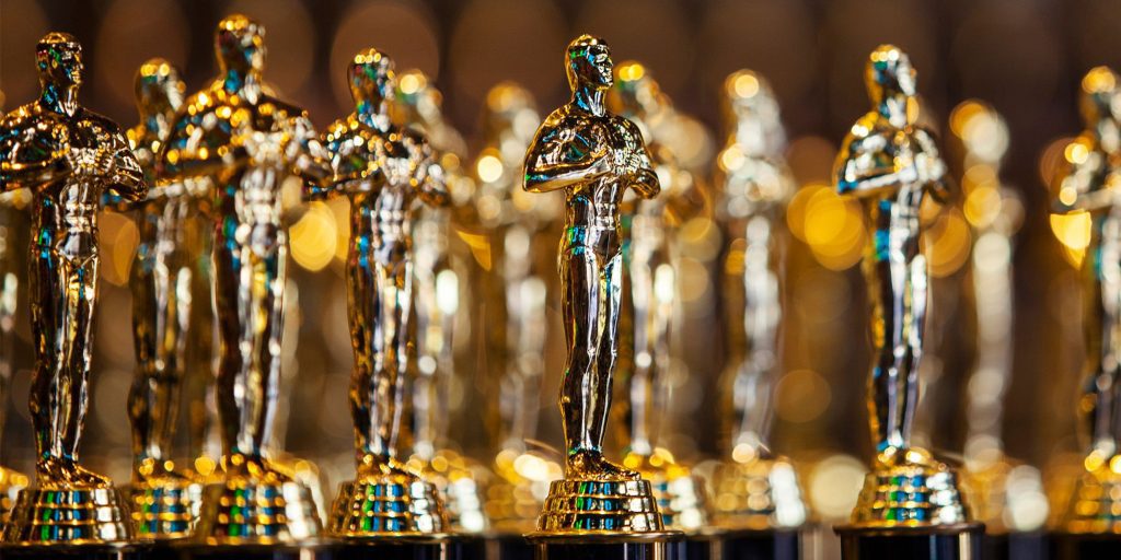 A crowd of very shiny Oscar trophies