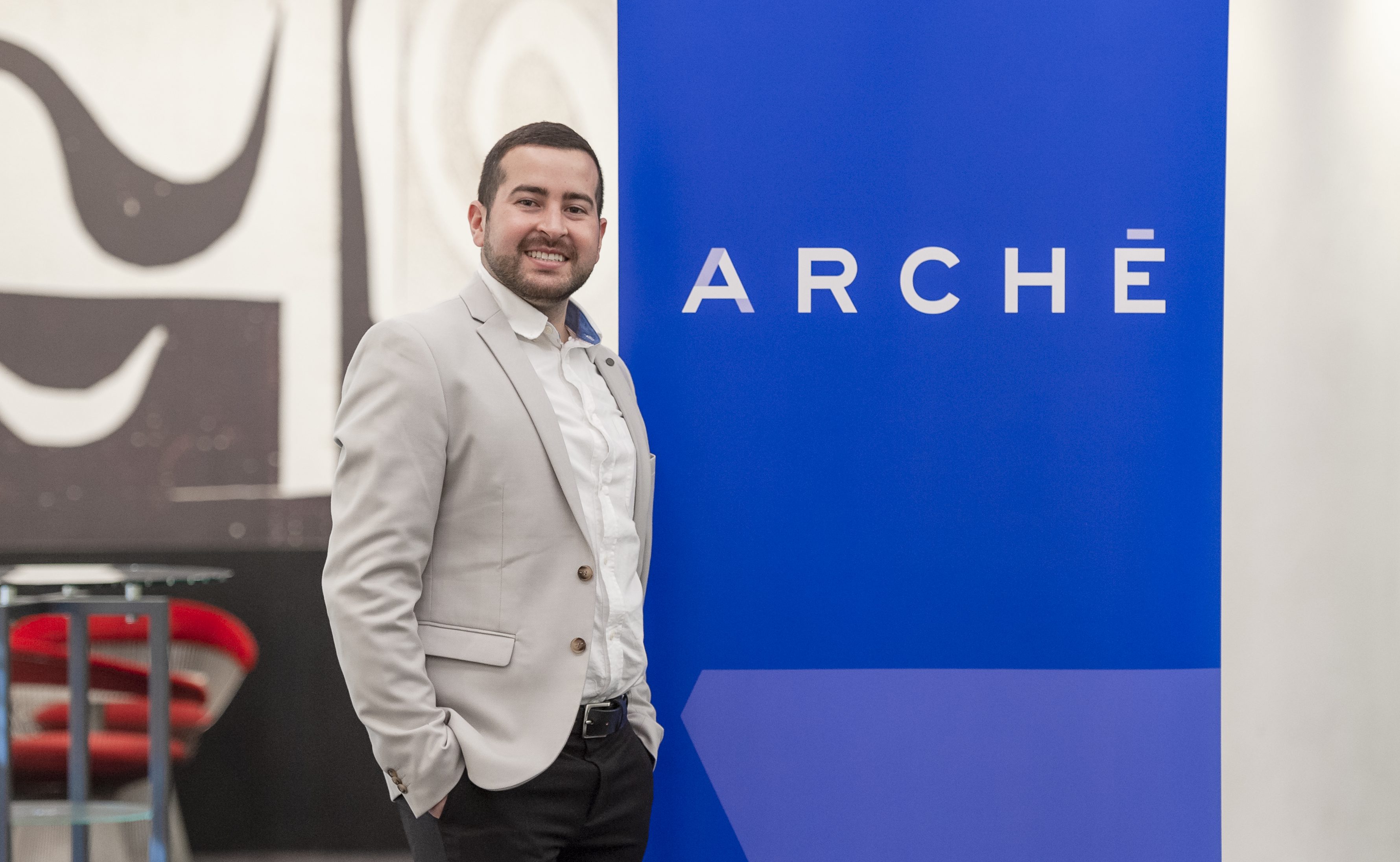 Daniel Nieto with the Arche banner
