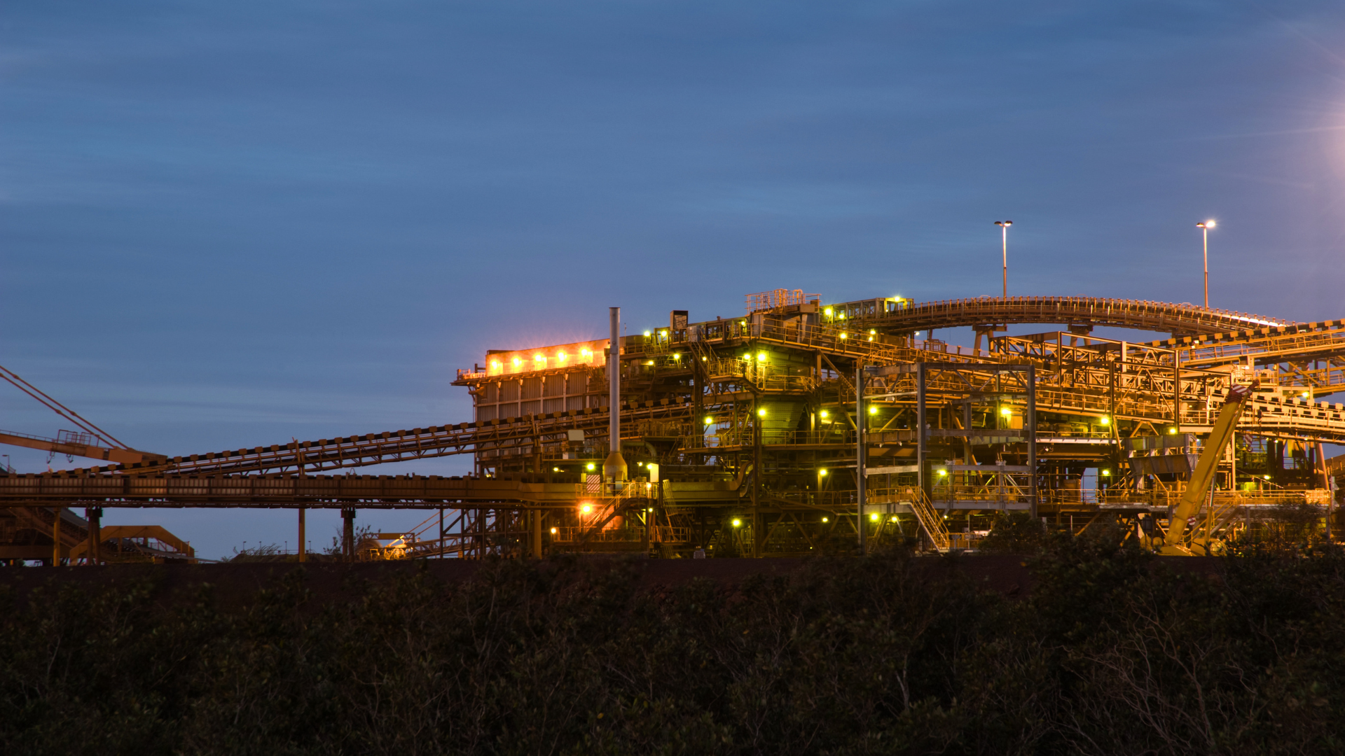 Iron ore mine site at dusk. Port Hedland, Western Australia